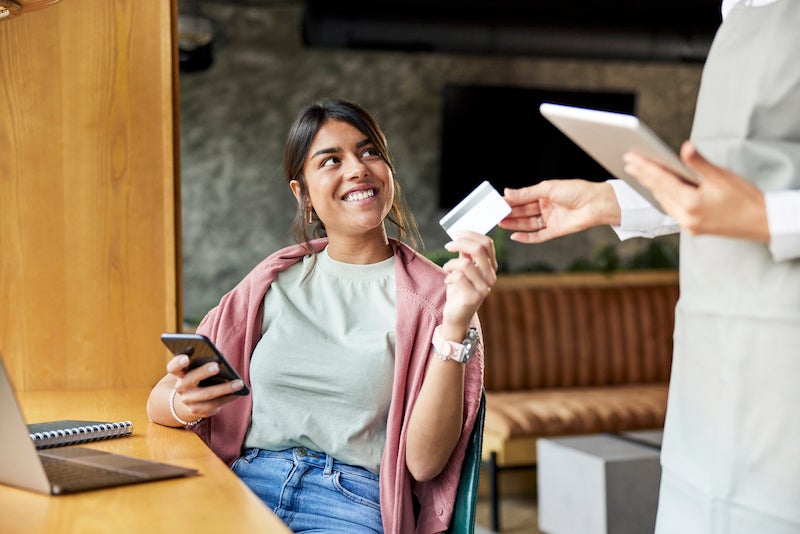 Woman exploring checking accounts with