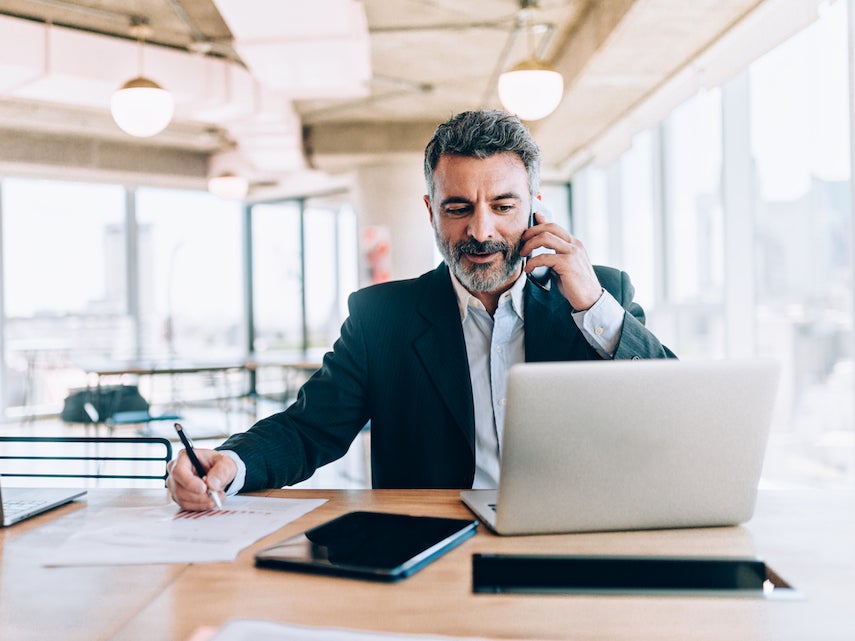 Man checking rates for Premium Interest Checking