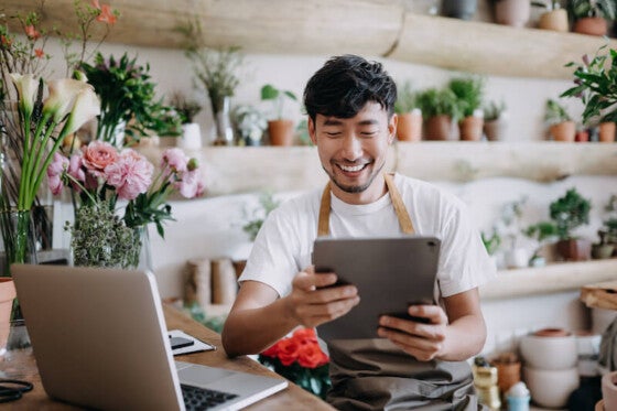 business owner looking at his savings account