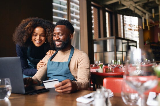 business owner with credit card