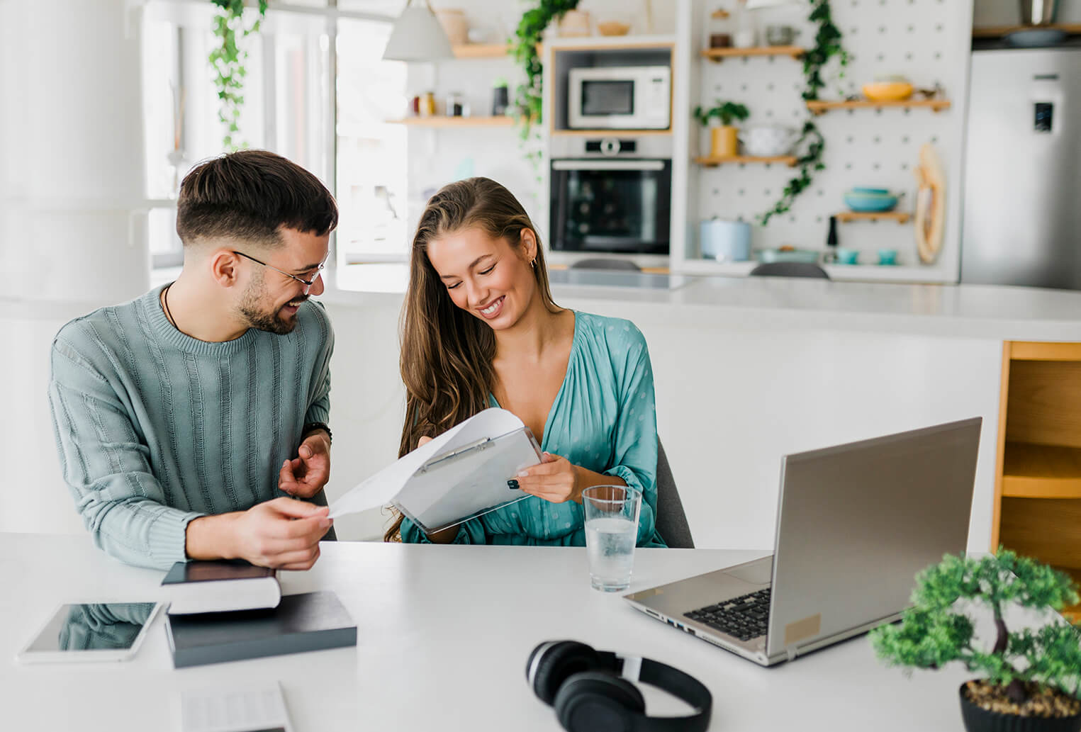 Young couple checking their savings account balance