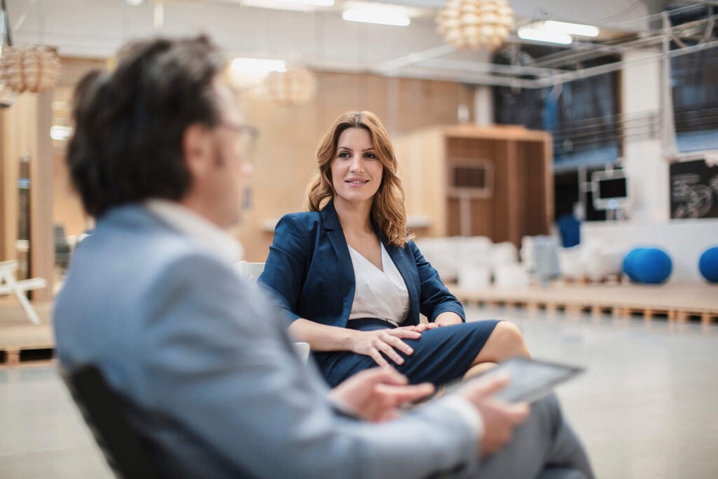 business owner discussing a loan with banker