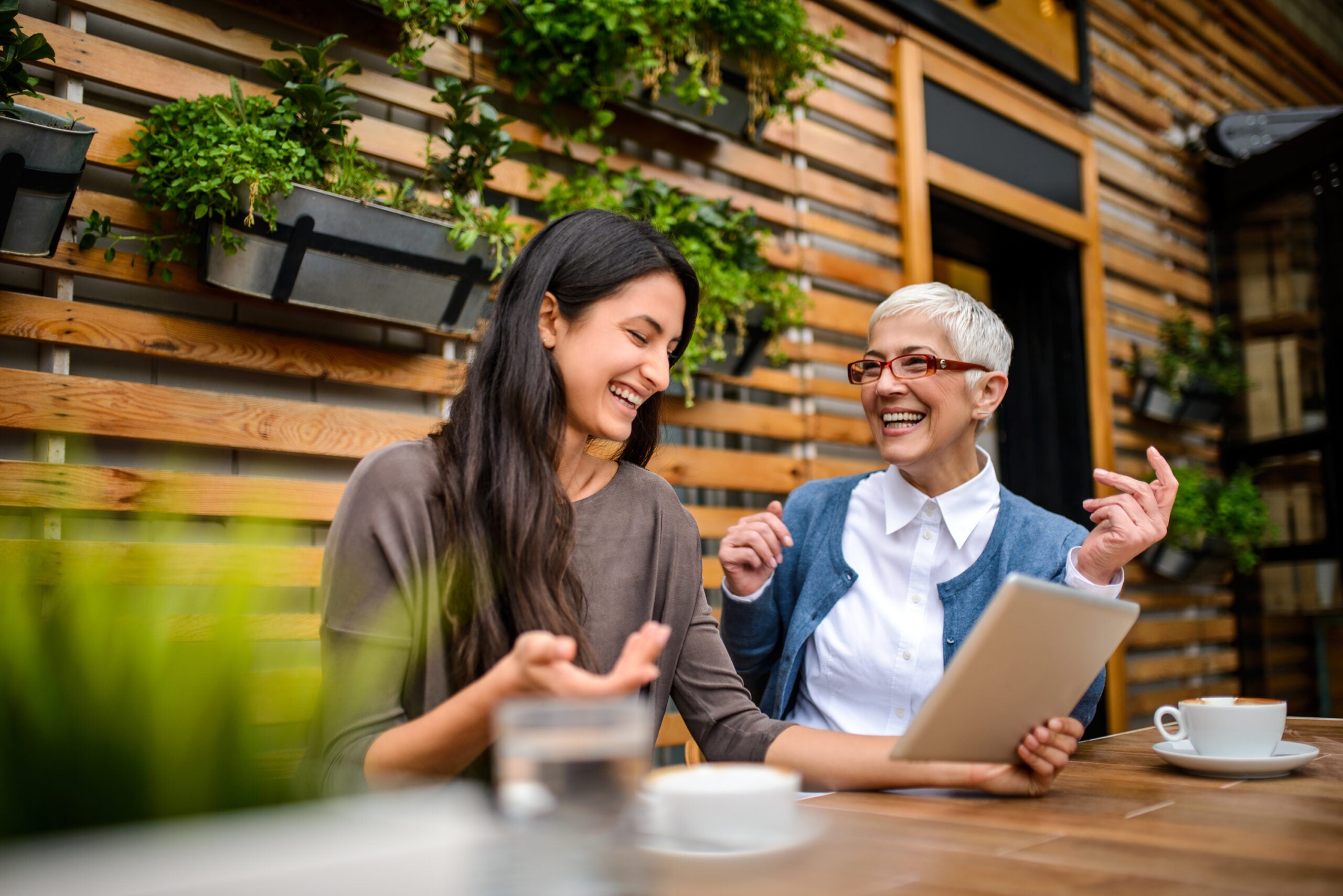 two women happy talking