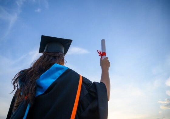 Graduates wear a black hat to stand for congratulations on graduation