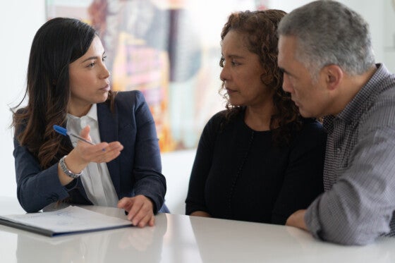 Older couple meeting with a financial advisor