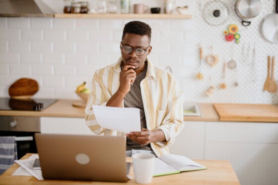 Man researching warehousing loans.