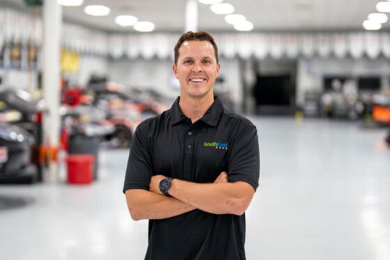 NASCAR Driver Trevor Bayne wearing SouthEast Bank polo in Charlotte, NC.