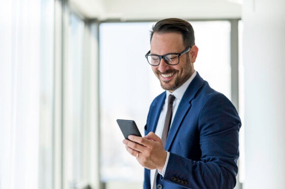 business owner checking bank account from phone