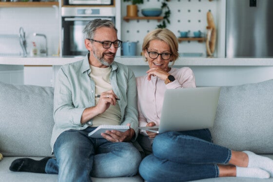 Couple looking at saving more for retirement and looking at CDs for retirement.