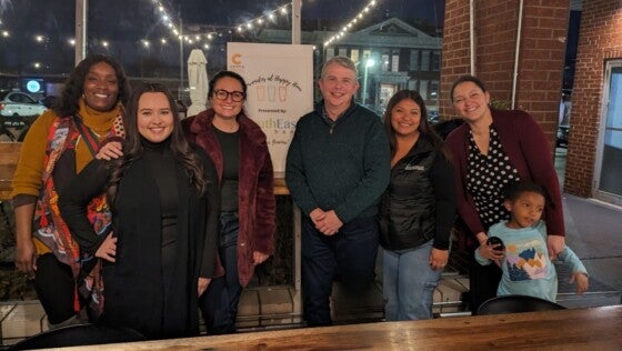 Group photo of SouthEast Bank and Centro Hispano representatives at sponsored event