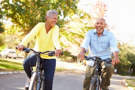 A couple riding bikes together