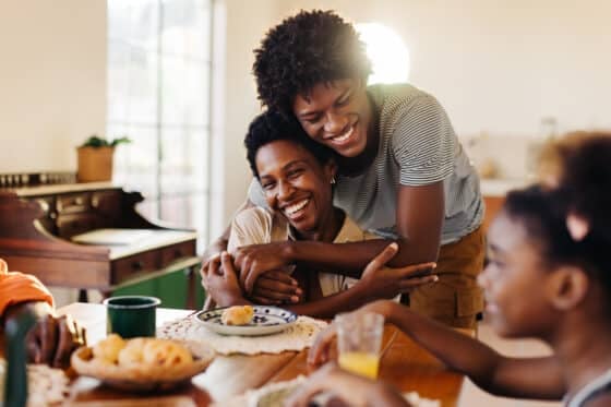 Happy family at the breakfast table